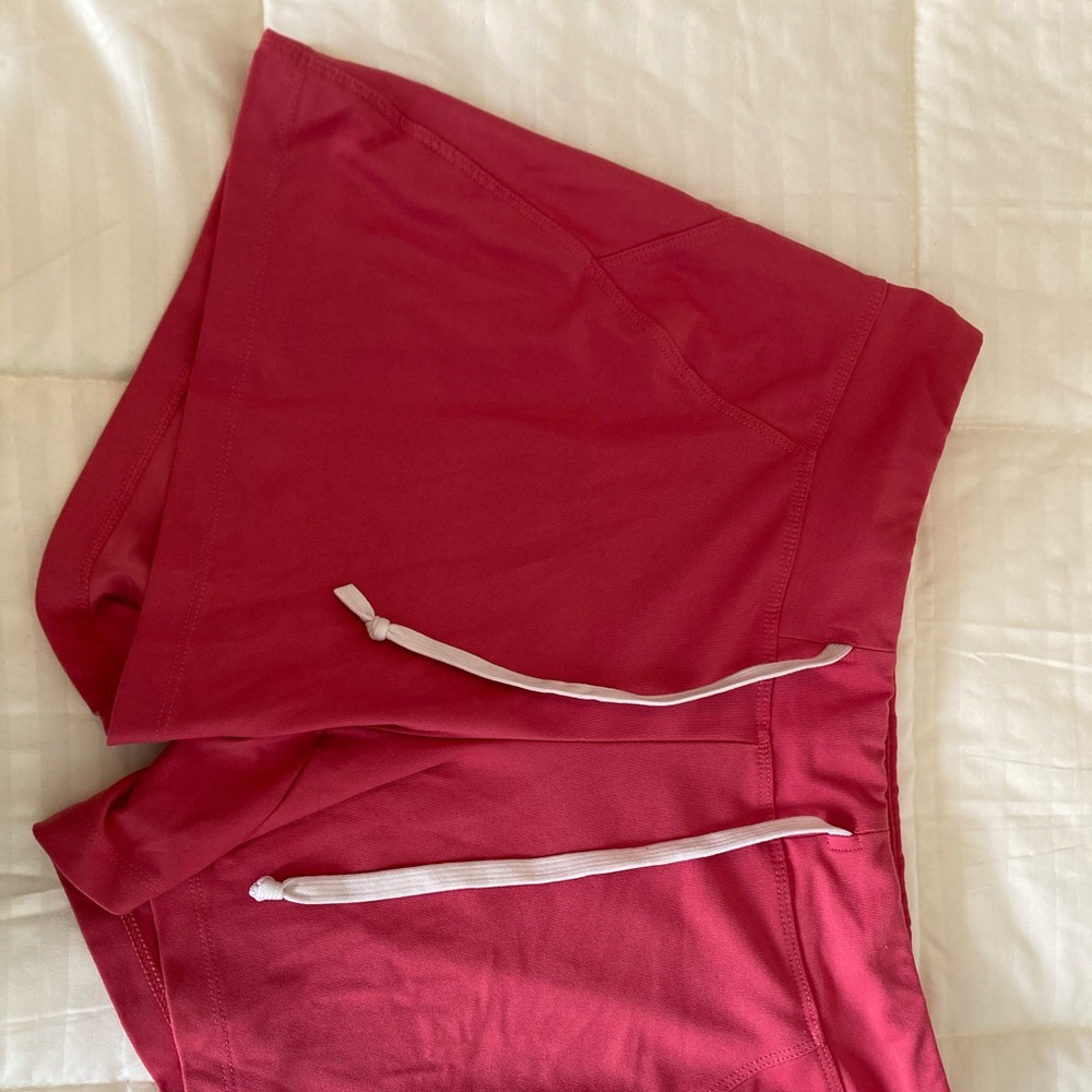 Pink Nike shorts